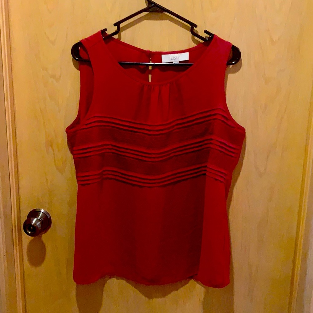 Rich or deep red close to a maroon loft shirt Lrg